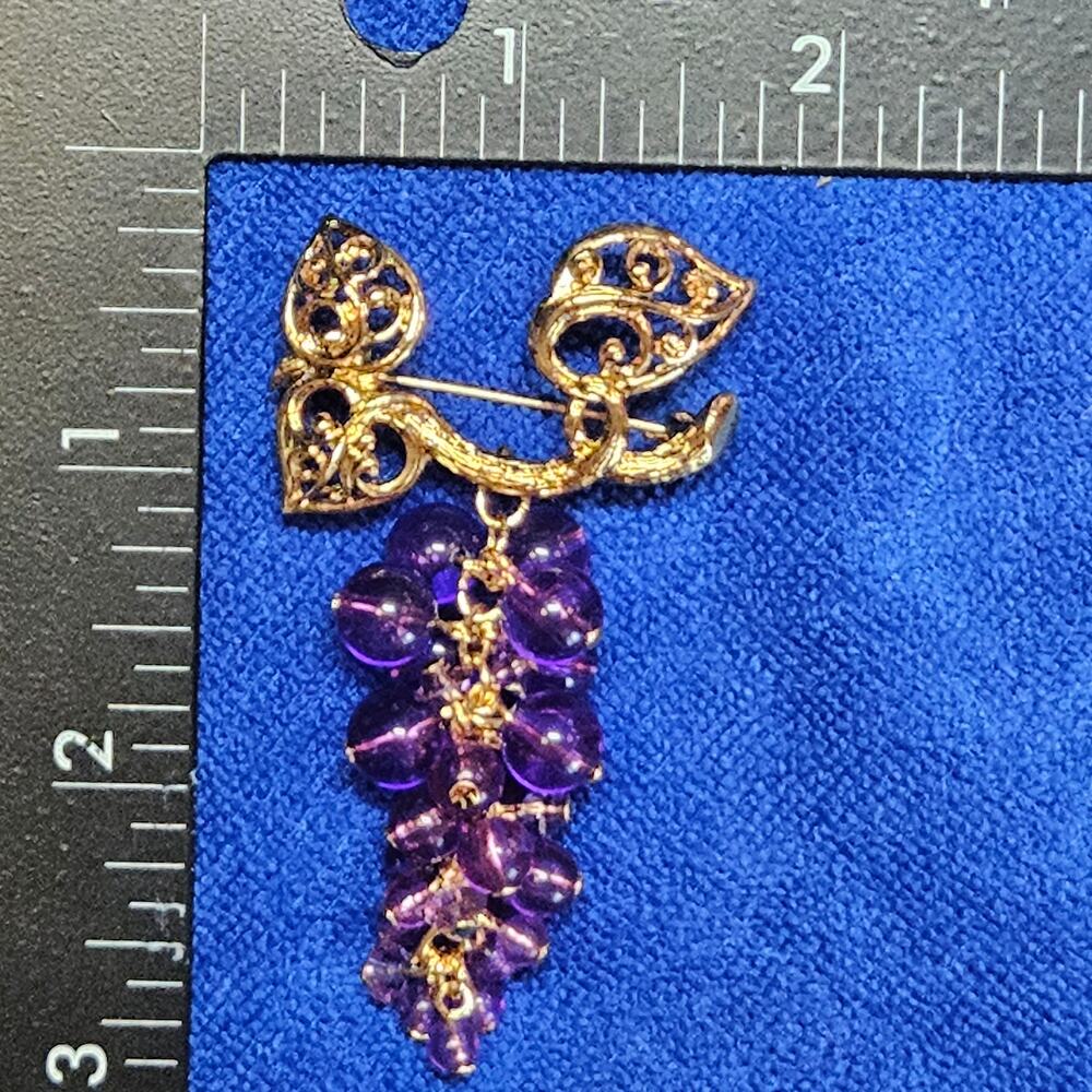 Vintage Avon Signed Gold Tone Purple Grape Cluster Filigree Brooch - 1970s